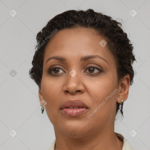 Joyful latino young-adult female with short  brown hair and brown eyes