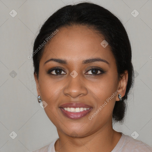 Joyful black young-adult female with medium  black hair and brown eyes