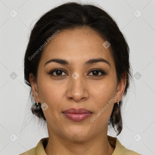 Joyful latino young-adult female with medium  brown hair and brown eyes