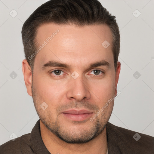 Joyful white young-adult male with short  brown hair and brown eyes