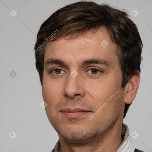 Joyful white adult male with short  brown hair and brown eyes