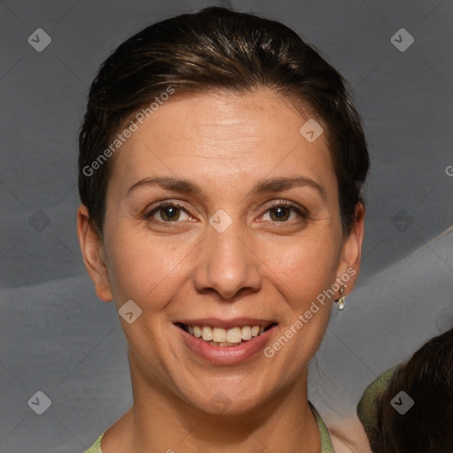 Joyful white adult female with short  brown hair and brown eyes