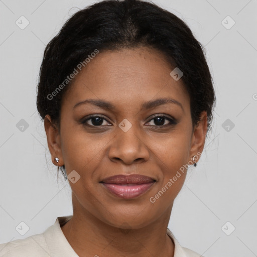 Joyful black young-adult female with short  brown hair and brown eyes