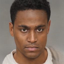 Neutral black young-adult male with short  brown hair and brown eyes