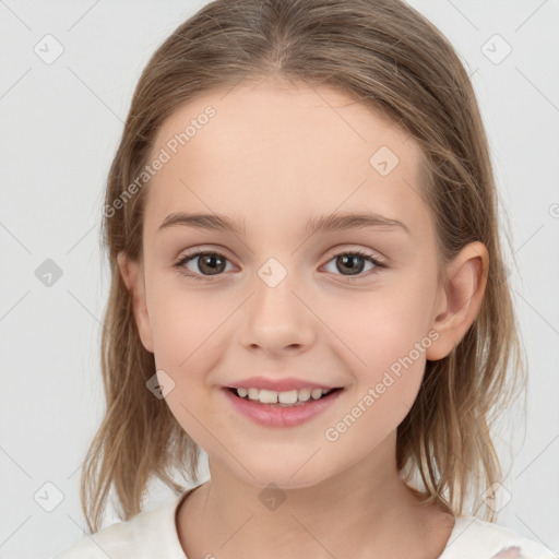 Joyful white child female with medium  brown hair and brown eyes