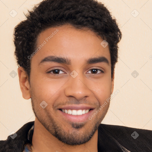 Joyful latino young-adult male with short  brown hair and brown eyes