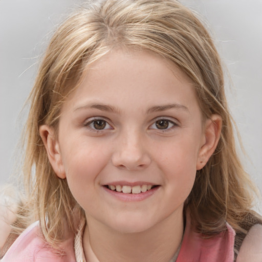 Joyful white child female with medium  brown hair and grey eyes