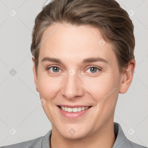 Joyful white young-adult female with short  brown hair and grey eyes