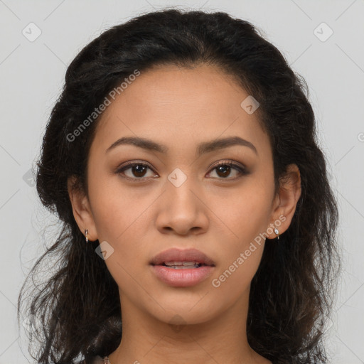 Joyful latino young-adult female with long  brown hair and brown eyes