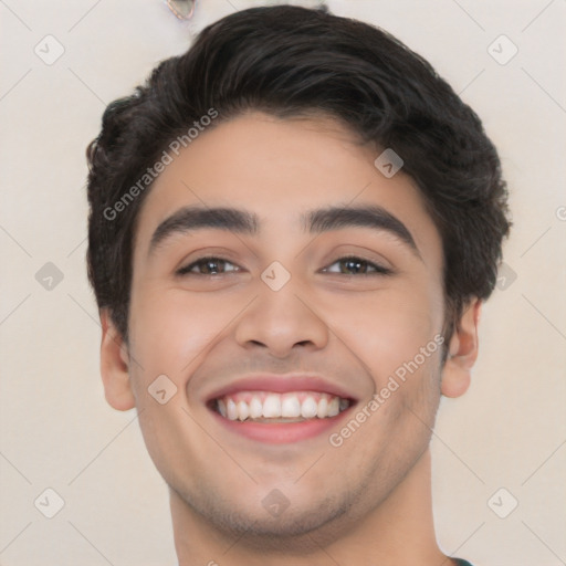 Joyful white young-adult male with short  black hair and brown eyes