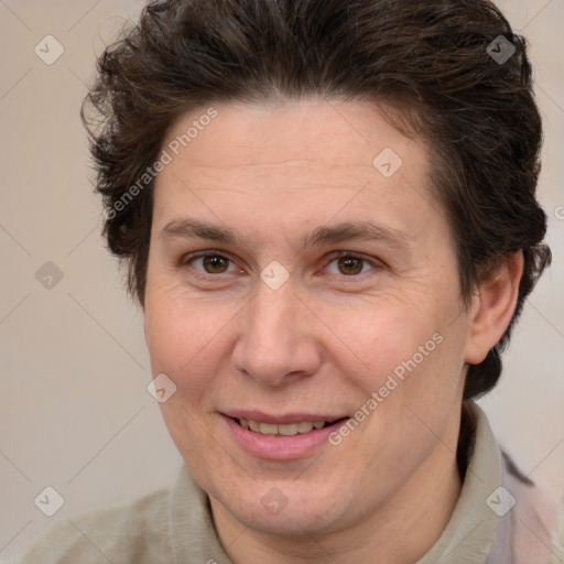 Joyful white adult female with short  brown hair and brown eyes