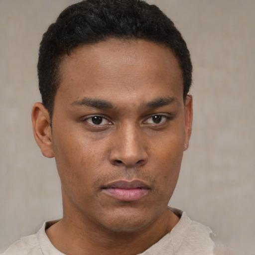 Neutral black young-adult male with short  brown hair and brown eyes