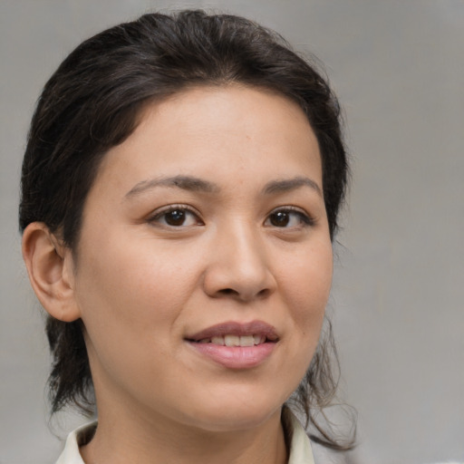 Joyful white young-adult female with medium  brown hair and brown eyes