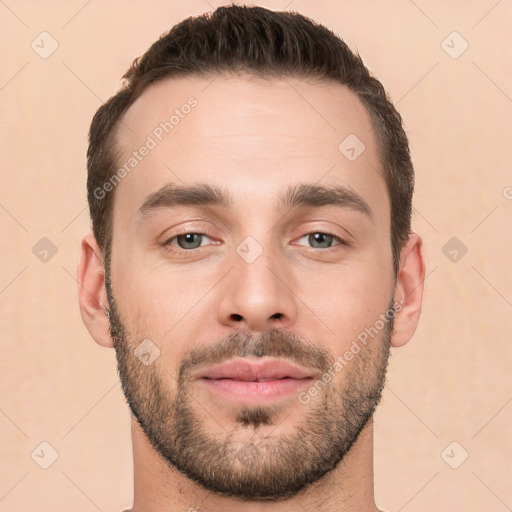 Joyful white young-adult male with short  brown hair and brown eyes