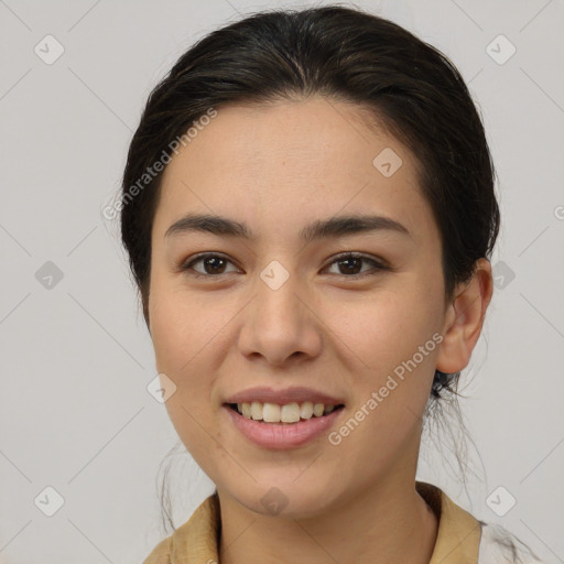 Joyful asian young-adult female with medium  brown hair and brown eyes