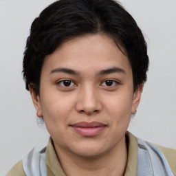 Joyful asian young-adult female with short  brown hair and brown eyes