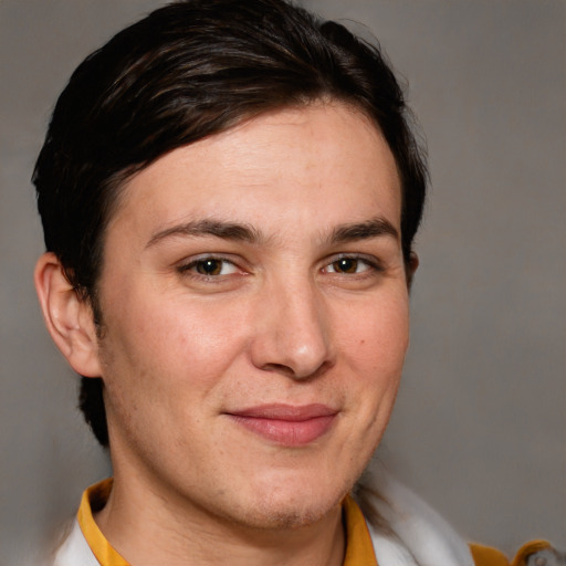 Joyful white adult female with short  brown hair and brown eyes