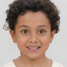 Joyful white child female with short  brown hair and brown eyes