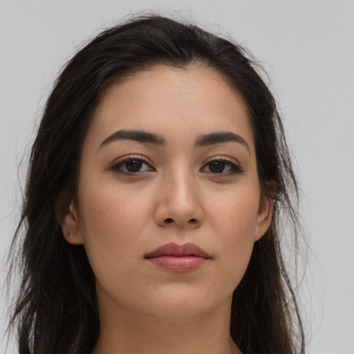 Neutral latino young-adult female with long  brown hair and brown eyes