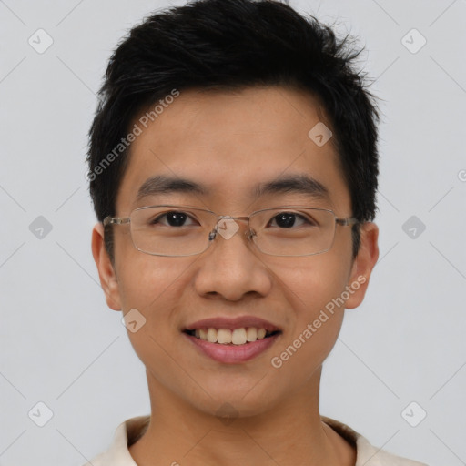 Joyful asian young-adult male with short  black hair and brown eyes