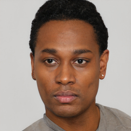 Neutral black young-adult male with short  black hair and brown eyes
