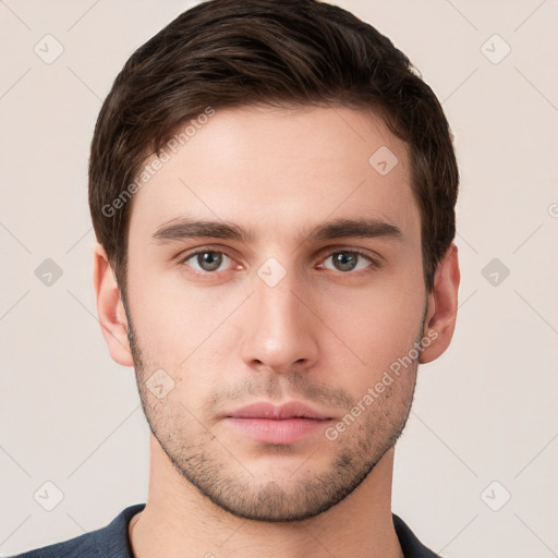 Neutral white young-adult male with short  brown hair and brown eyes