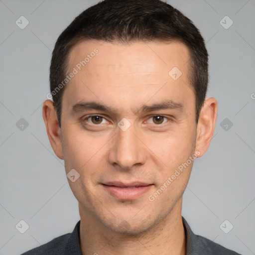 Joyful white young-adult male with short  brown hair and brown eyes