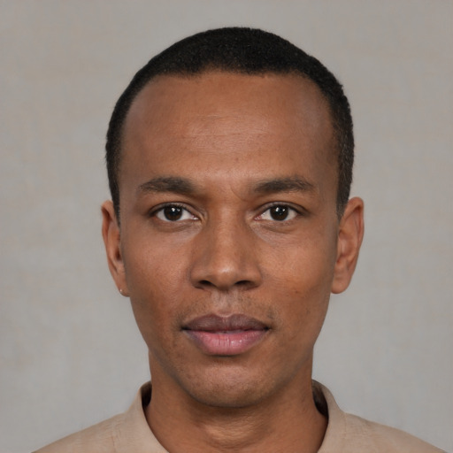Neutral black young-adult male with short  black hair and brown eyes