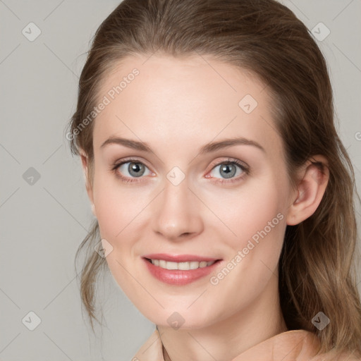 Joyful white young-adult female with medium  brown hair and blue eyes