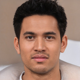 Neutral white young-adult male with short  black hair and brown eyes