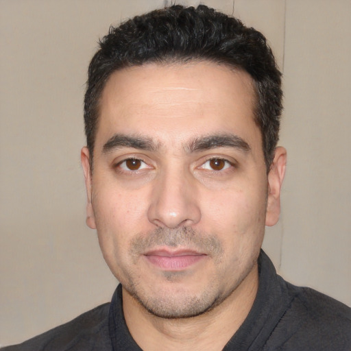 Neutral white young-adult male with short  black hair and brown eyes