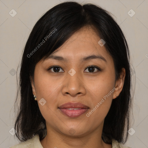 Joyful asian young-adult female with medium  brown hair and brown eyes