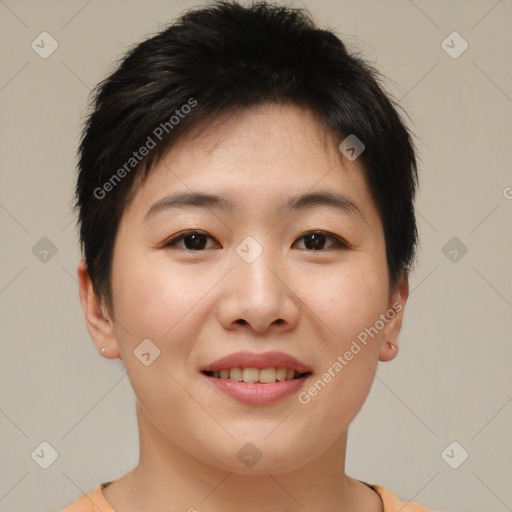 Joyful asian young-adult female with short  brown hair and brown eyes