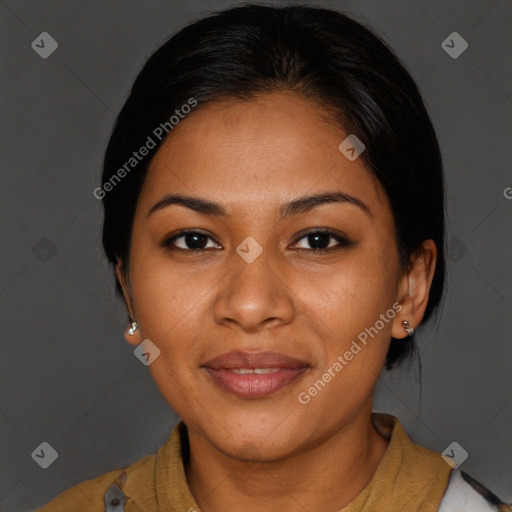 Joyful latino young-adult female with medium  brown hair and brown eyes