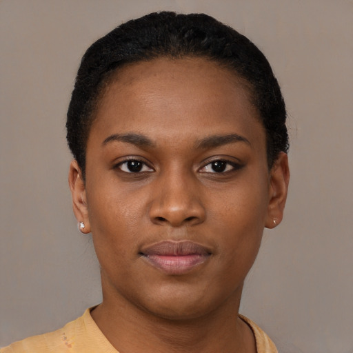 Neutral black young-adult female with short  black hair and brown eyes