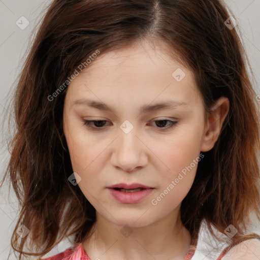 Joyful white child female with medium  brown hair and brown eyes