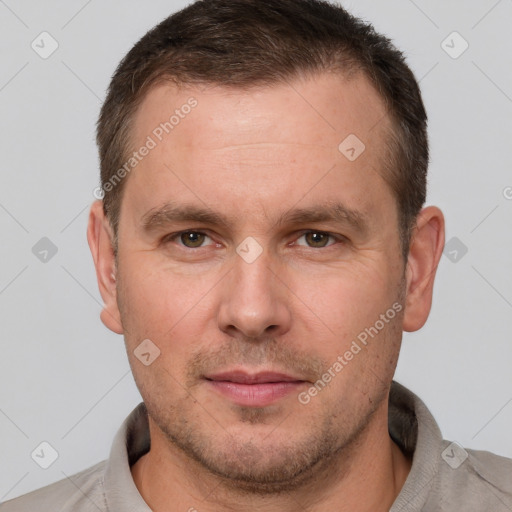 Neutral white adult male with short  brown hair and grey eyes