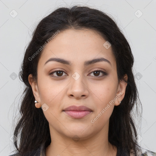 Joyful latino young-adult female with long  brown hair and brown eyes