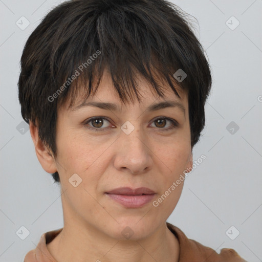 Joyful white adult female with short  brown hair and brown eyes