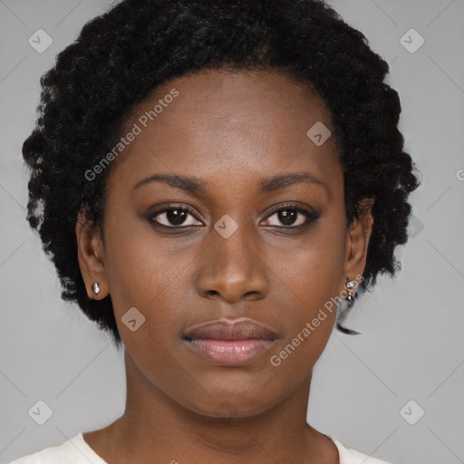 Neutral black young-adult female with short  brown hair and brown eyes