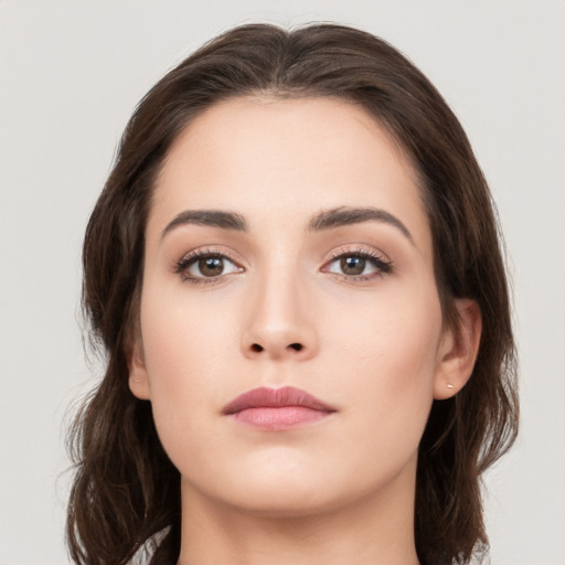 Neutral white young-adult female with medium  brown hair and brown eyes