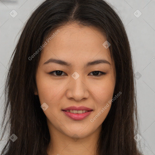 Joyful asian young-adult female with long  brown hair and brown eyes