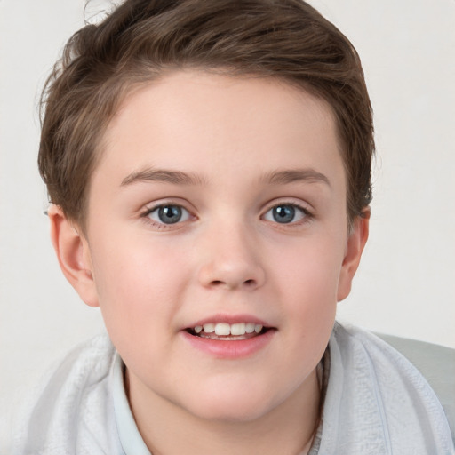 Joyful white child female with short  brown hair and grey eyes