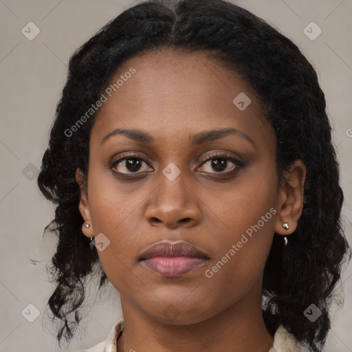 Joyful black young-adult female with medium  brown hair and brown eyes