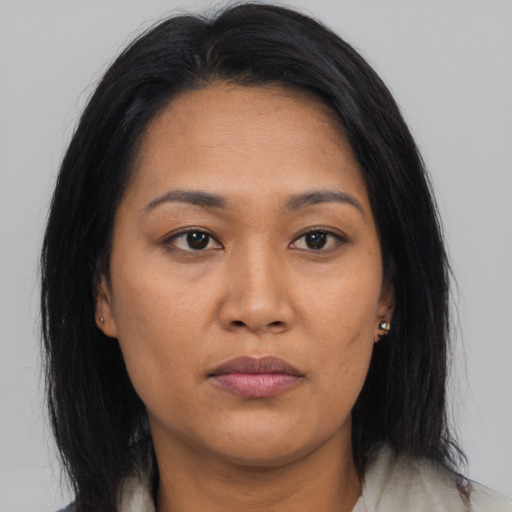 Neutral asian young-adult female with long  brown hair and brown eyes