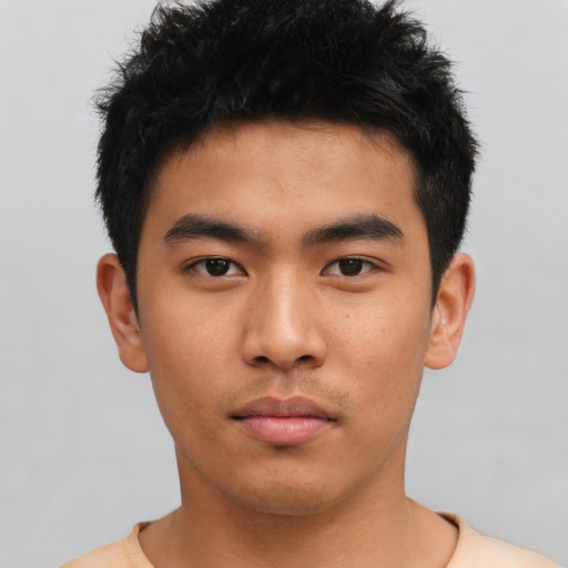 Neutral asian young-adult male with short  black hair and brown eyes