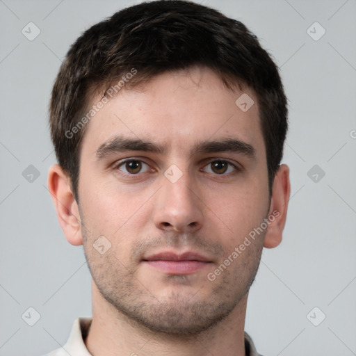 Neutral white young-adult male with short  brown hair and brown eyes