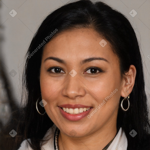 Joyful latino young-adult female with long  brown hair and brown eyes