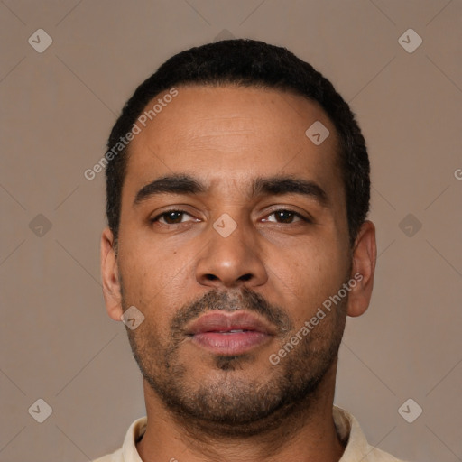 Neutral latino young-adult male with short  black hair and brown eyes