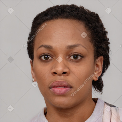 Neutral black young-adult female with short  brown hair and brown eyes